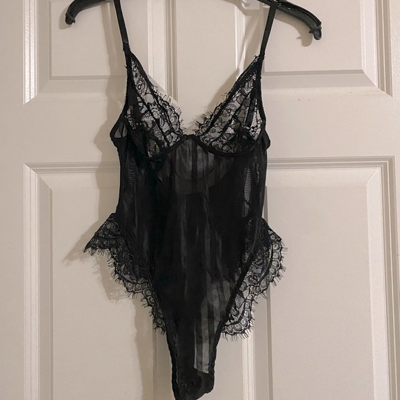 A black, new teddy or bodysuit. - Picture 2 of 2